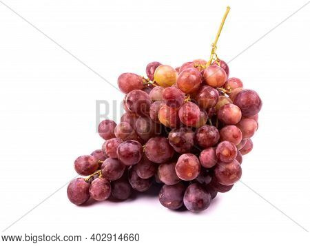 Bunch Of Grapes On White Background. Red Globe Variety Of Large, Seeded Red Grapes. Isolated High Qu