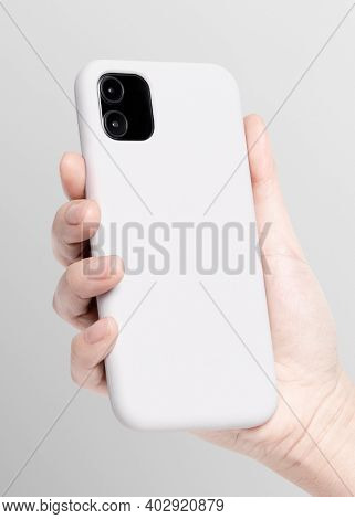 White mobile phone case mockup in hand product showcase b
