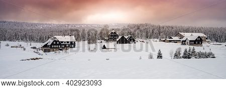 Winter In Jizera Mountains. Cloudy Evening In Jizerka Village, Czech Republic