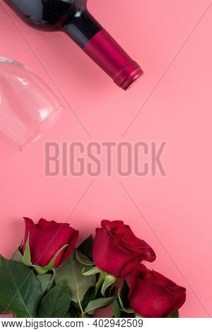 Valentine's Day Dating Gift With Wine And Rose Concept On Pink Background