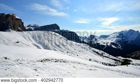 Winter mountain landscape in Dolomites Alps. View on Sella peak and mount Marmolada. South Tyrol, Italy.