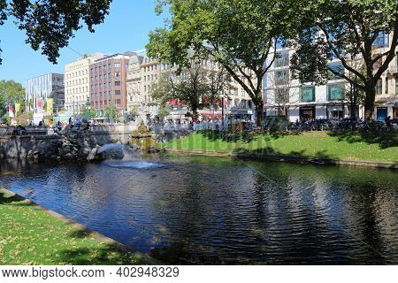 Dusseldorf, Germany - September 19, 2020: People Visit Koenigsallee, Famous Shopping Destination In 