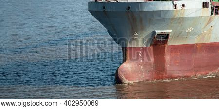 Closeup Of Multipurpose Ship Bulbous Bow Underway.