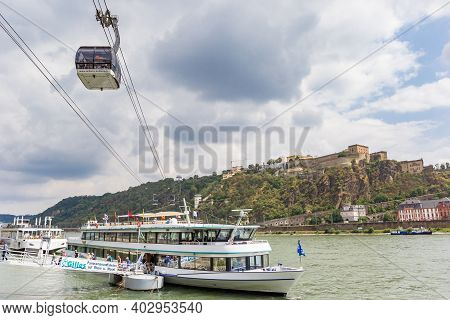 Koblenz, Germany - August 03, 2019: Cruiseboat And Cable Car At The River Rhine In Koblenz, Germany