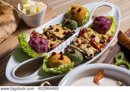 Georgian Snack Named Phali With Salad On A White Plate