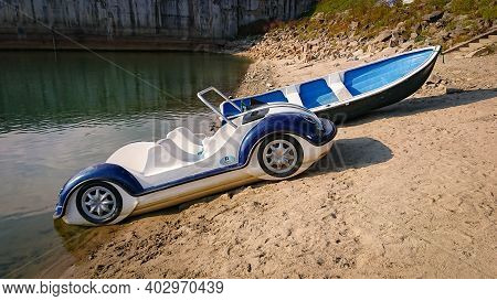 Solina, Poland - September 05, 2018: Paddle Boat (or Pedalo) In The Shape Of A Car. Entertainment Fo