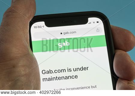 Morgantown, Wv - 12 January 2021: Modern Iphone With Gab Social Media Site Down For Maintenance And 