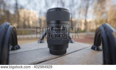 Russia, Moscow-december, 2020: Close-up Of Professional Camera Lens. Action. Lens For Professional C