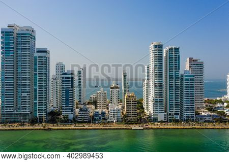 Skyscraper Glass And White Facades At A Bright Sunny Day On The Blue Sky Background. Economy Finance