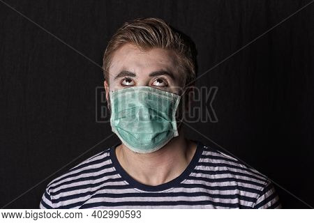Young Male Mime Artist With Face Mask