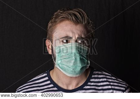 Young Male Mime Artist With Face Mask