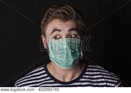 Young Male Mime Artist With Face Mask