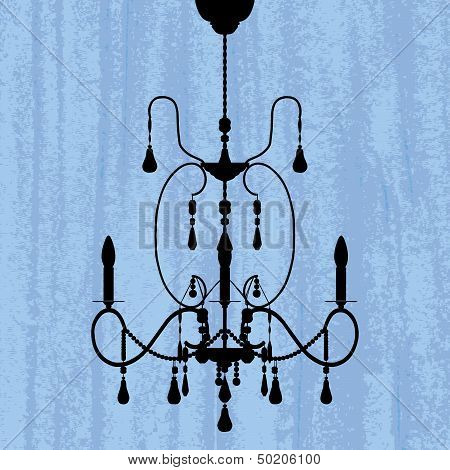 silhouette of luxury chandelier on a scratched blue wallpaper/ template design of invitation