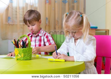 Two Cute Little Prescool Kids Drawing