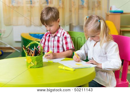 Two Cute Little Prescool Kids Drawing