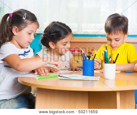 Group Of Cute Little Prescool Kids Drawing