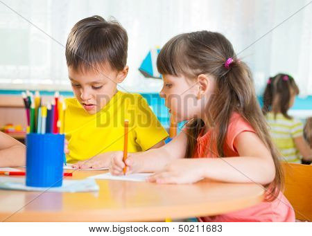 Group Of Cute Little Prescool Kids Drawing