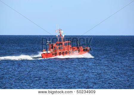 Pilot Boat Orange Tugboat At The Sea