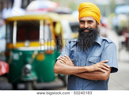 Indian auto rickshaw three-weeler tuk-tuk taxi driver man