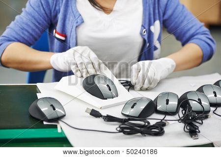 chinese worker assembling production at line conveyor in china factory manufacturing