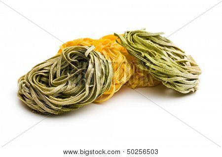 Italian pasta tagliatelle on white background