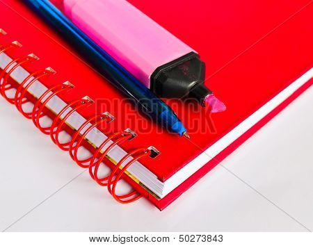 Notebook and pen