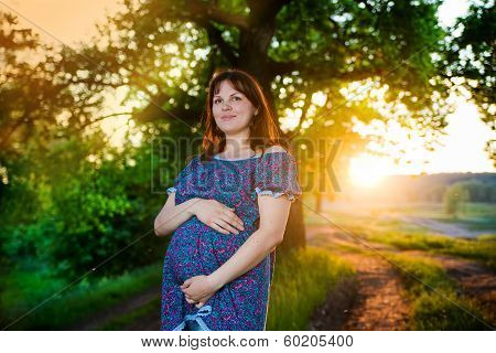 Pregnant Woman In Nature