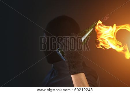 molotov cocktail in activist hand