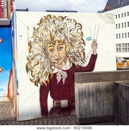 Struwwelpeter Painting At A Wall