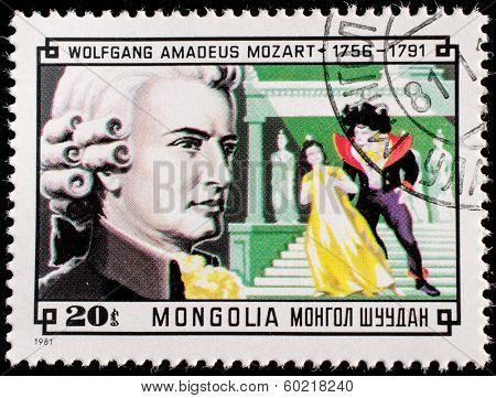 MONGOLIA - CIRCA 1981:A stamp printed by Mongolia, shows Composer Wolfgang Amadeus Mozart and Scene from his Magic Flute, circa 1981 