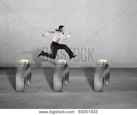 man jumping Over Euro Obstacles