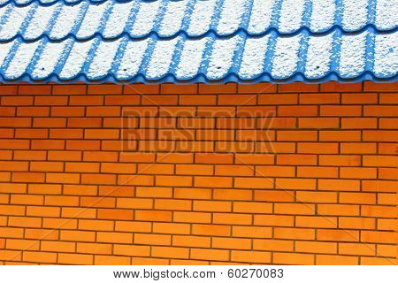 Brick Wall And Roof Of The House