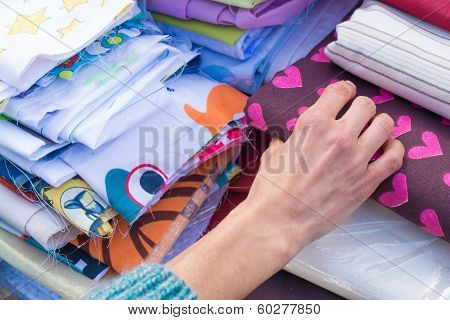 Fabrics On A Market Stall