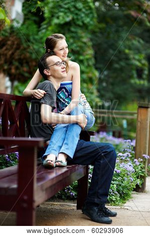 Happy Couple On Park Bench