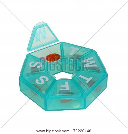 Green Pill Dispenser In The Shape Of A Wheel