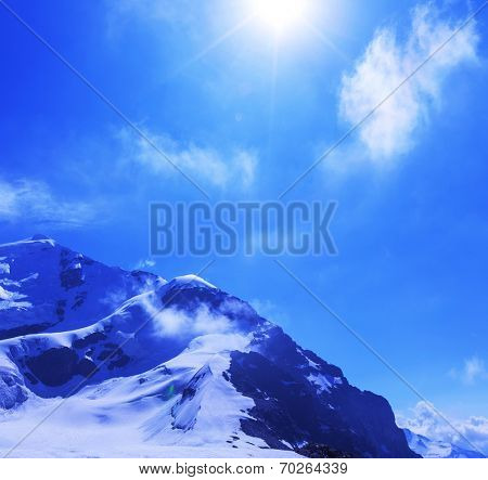 main Caucasian ridge at sunset.Tetnuld and Gestola peaks,Georgia