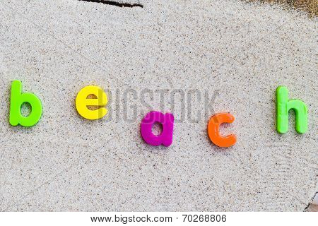 The Word Beach Laid Sand