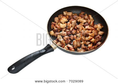 Pork Meat Fried On The Pan Isolated Over White