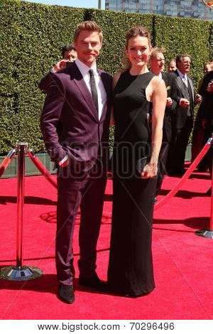 LOS ANGELES - AUG 16:  Derek Hough, Amy Purdy at the 2014 Creative Emmy Awards - Arrivals at Nokia Theater on August 16, 2014 in Los Angeles, CA