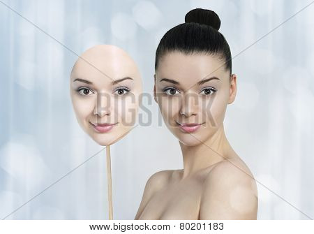 Beautiful Young Woman With  Dark Skin And Light Skin Face Mask
