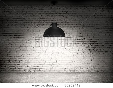 White grunge brick wall and black plafond are lights wall and floor from stone 