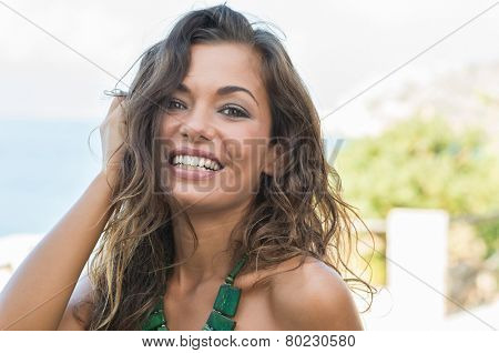 Portrait Of Young Beautiful Woman Smiling Outdoor