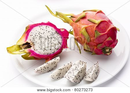 Pitaya, Whole, Halved And Cut Into Fruit Wedges