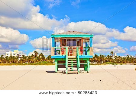 MIAMI, USA - JUNE 7, 2012: wooden colorful beach watch hut at the beautiful white beach