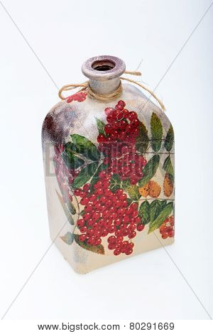 bottle decorated using different techniques of decoupage