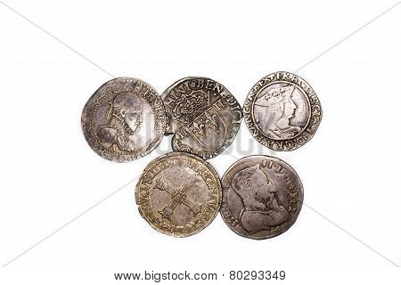 Vintage Silver Coins With Portraits On A White Background