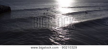 Surfers at Bournemouth Pier