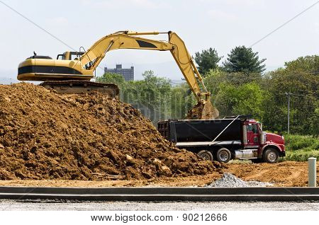 Construction Excavator And Dump Truck