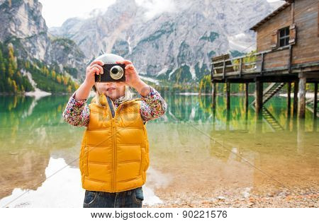 Blonde Girl At Lake Bries Taking A Photo With A Digital Camera