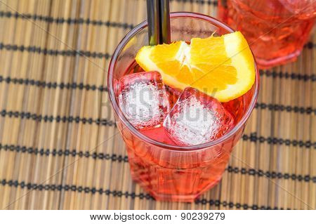 Top Of View Of Spritz Aperitif Aperol Cocktail With Orange Slices And Ice Cubes